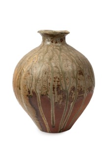 PETER RUSHWORTH stoneware vase with green and gold drip glaze, impressed artist's seal to base, 31cm high