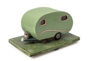 FAIRLIE KINGSTON "The Green Caravan, 2010", illuminated ceramic sculpture, artist monogram to the plinth, with Australian Galleries exhibition brochure bearing image to back cover, 17cm high, 30cm wide, 19.5cm deep