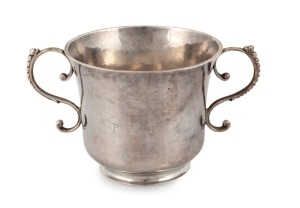 An 18th century CHANNEL ISLANDS silver christening cup by unknown maker stamped "I.A." of Guernsey, circa 1777, engraved "R.G.L. 1777, P.T.D.", 6.5cm high, 12cm wide, 100 grams