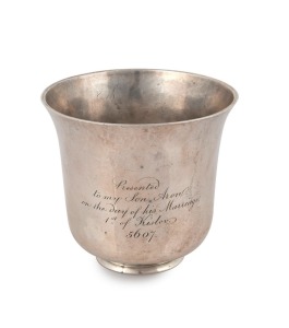 JUDAICA: 18th century CHANNEL ISLANDS silver wine beaker stamped "S.R." of Jersey, circa 1790, engraved with later inscription "Presented to my son Aron on the day of his marriage, 1st of Kislev 5607" [1846], 6.5cm high, 74 grams.