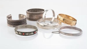Seven assorted antique and vintage silver and gold plated bangles, including STEVENSON of Adelaide, Australian, New Zealand and Italian makers, 19th and 20th century, 160 grams not including gold plated example