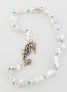 BRENDA COLEMAN of Sydney, contemporary Australian Keshi pearl and emerald necklace with silver and 18ct gold seahorse adornment, stamped "B.C. 925, 18ct" with pictorial cat mark, bearing original label "B. Coleman 4. $1,100", 52cm long