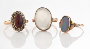 Three antique gold rings, set with moonstone, opal, diamonds and red stone, 19th/20th century, 11.9 grams total