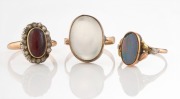 Three antique gold rings, set with moonstone, opal, diamonds and red stone, 19th/20th century, 11.9 grams total