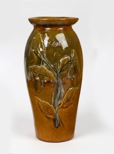 LIND tall green and brown glazed pottery vase with applied leaves, incised "E. LIND, April, 1912", ​​​​​​​35cm high