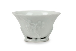 An antique Chinese blanc de chine porcelain libation cup, Kangxi period, circa 1700, 5cm high, 8cm wide