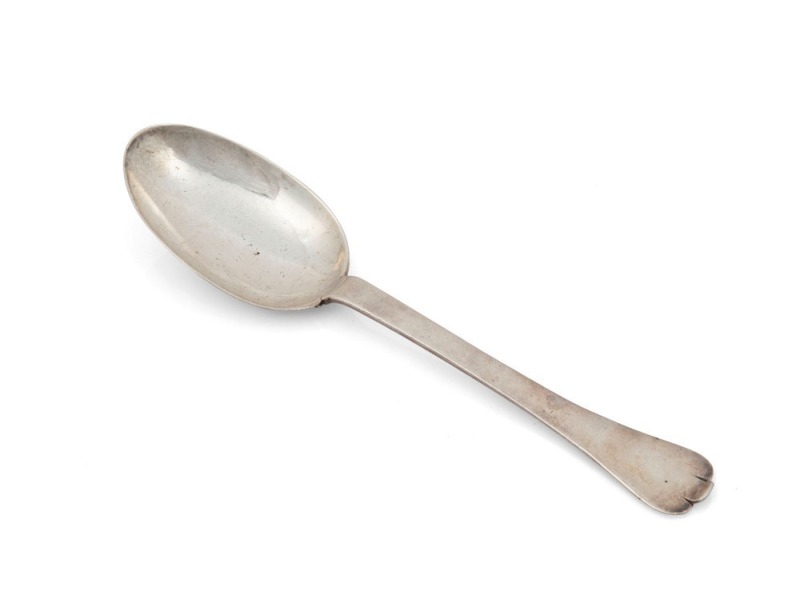 An 18th century CHANNEL ISLANDS silver trefid spoon by unknown maker stamped "G.D.", most likely Guernsey, circa 1710, engraved "P.C.", 18.3cm long, 42 grams