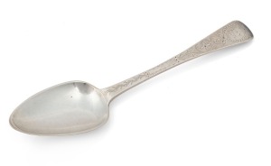 An antique CHANNEL ISLANDS bright cut silver serving spoon by THOMAS DE GRUCHY & JEAN LE GALLAIS of Jersey, circa 1840, engraved "A.A.V. Born Jan. 20, 1841", 23cm long, 86 grams