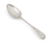 An antique CHANNEL ISLANDS bright cut silver serving spoon by GEORGE MAUGER of Jersey, circa 1810, engraved "A.E.G.T. N. 6 SEP. 1810.", ​​​​​​​20.5cm long, 46 grams