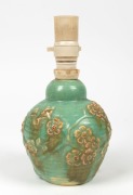 Nell McCREDIE green glazed pottery lamp base with floral decoration, incised "McCredie, N.S.W.", ​​​​​​​23cm high overall