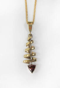 PENDANT: 9ct gold garnet fish pendant and chain.