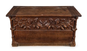 ROBERT PRENZEL Australian blackwood blanket box, carved with gumnuts, leaves and branches, early 20th century, ink stamp "Toorak Road" label to base, 45cm high, 90cm wide, 46cm deep
