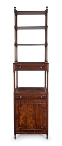 An antique English mahogany waterfall front wotnot with cabinet base and two drawers, circa 1800, 199cm high, 52cm wide, 41cm deep