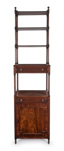 An antique English mahogany waterfall front wotnot with cabinet base and two drawers, circa 1800, 199cm high, 52cm wide, 41cm deep