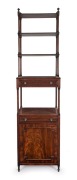 An antique English mahogany waterfall front wotnot with cabinet base and two drawers, circa 1800, 199cm high, 52cm wide, 41cm deep