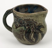 G. EVELYN M. DAVIES green glazed pottery jug with applied gumnuts and leaves, incised "G.E.M. DAVIES", 8cm high - 2