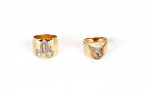 RINGS: Two modern gold and diamond set rings. 9.5 grams.