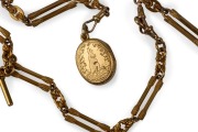 An antique Australian 15ct gold Albert fob chain with 15ct gold oval locket engraved with a kangaroo, 19th century, stamped "15ct", an impressive 75cm long, 114 grams total - 2