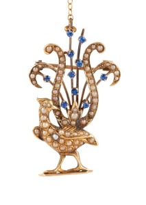 DUGGIN, SHAPPERE & Co. of Melbourne, rare antique 15ct gold lyrebird brooch, set with blue sapphires and seed pearls, 19th century, stamped "15" flanked by pictorial marks, 4.2cm high, 7 grams