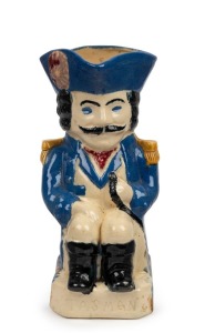 JOHN CAMPBELL "ABEL TASMAN" pottery Toby jug inscribed "TASMAN" at front, incised to base "Cpt. J.H. FERTON, 1936, From The Boys, Members, Wall Lab Club", 25.5cm high.
