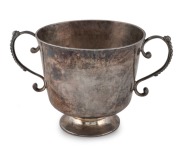 An 18th century CHANNEL ISLANDS Guernsey christening cup with unusually high base, unknown maker, stamped "I.H.", circa 1745, inscribed "M.F.L.", ​​​​​​​7.5cm high, 12.5cm wide, 122 grams