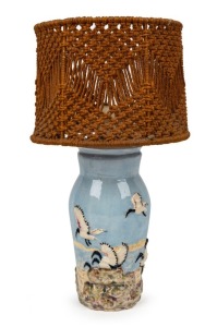 ARTIST UNKNOWN Australian art pottery table lamp and shade, decorated with applied ibis in coastal landscape, 46cm high overall