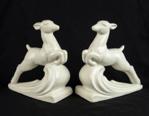 DIANA pair of Australian Art Deco cream glazed ceramic gazelle bookends, impressed "DIANA AUSTRALIA", 19cm high