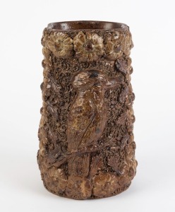 Brickworks kookaburra vase with floral decoration, most likely a workman's piece, 27cm high