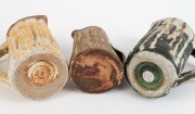 NINA MATHEWSON group of three studio pottery jugs with triangular form handles, ​​​​​​​the largest 20cm high - 2
