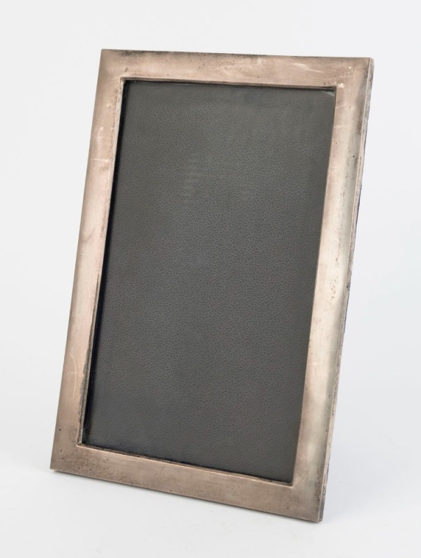 An English sterling silver picture frame by Walker & Hall of Birmingham, circa 1908, ​​​​​​​38.5 x 26cm overall