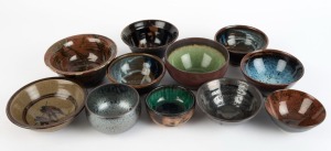 Eleven assorted studio pottery bowls, the largest 8cm high