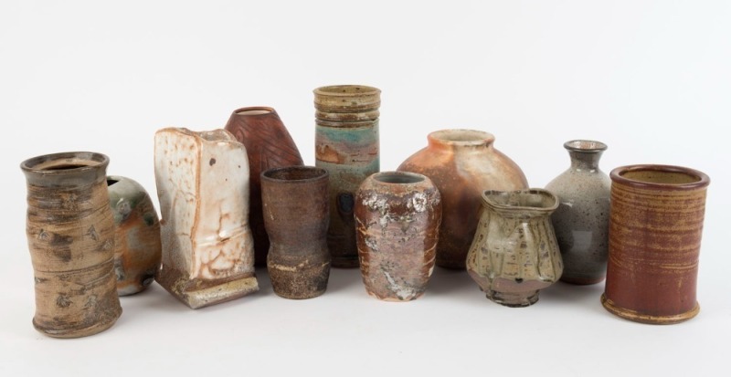 Eleven assorted Australian brown and salt glazed studio pottery vases, including HILLARY JONES and CATHY WILLIAMS, the largest 22cm high