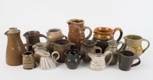 Fifteen assorted pottery jugs, the largest 21cm high