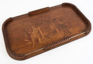 A folkart Australian serving tray with inlaid coat of arms, early 20th century, 58cm wide