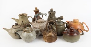 Ten assorted pottery teapots and jugs, various makers and vintages, the largest 24cm high