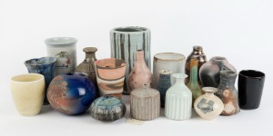 Eighteen assorted pottery vases, 21cm high