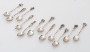LINTON of Perth, set of 12 Australian silver spoons with wildflower motifs, 20th century, stamped "JAL. ST. SILVER", 11cm long, 152 grams total