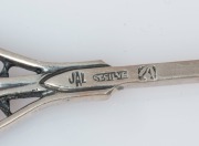 LINTON of Perth, set of 12 Australian silver spoons with wildflower motifs, 20th century, stamped "JAL. ST. SILVER", 11cm long, 152 grams total - 13