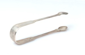 Antique CHANNEL ISLAND fiddle pattern silver sugar tongs by CHARLES WILLIAM QUESNEL of Guernsey, early 19th century, engraved "L.L.M. Nov. 1833", 15cm long, 42 grams