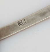 An 18th century CHANNEL ISLANDS silver pair of trefid spoons by JEAN GAVEY of Jersey, circa 1730, both engraved "E.L.C.", 18cm long, 74 grams total - 2