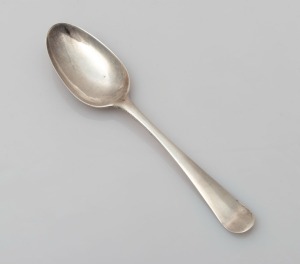 An 18th century CHANNEL ISLANDS silver dessert spoon with scallop back, by PIERRE MAINGY of Guernsey, circa 1750s, engraved "T.N.T. M.", 19.5cm long, 52 grams 