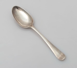 An 18th century CHANNEL ISLANDS silver dessert spoon with scallop back, by PIERRE MAINGY of Guernsey, circa 1750s, engraved "T.N.T. M.", 19.5cm long, 52 grams