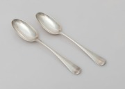 A pair of antique CHANNEL ISLANDS Hanoverian tablespoons, stamped "L.C.", of Jersey, circa 1760, both engraved with griffin crests, 19.5cm long, 92 grams total