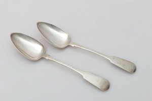 A pair of antique CHANNEL ISLANDS fiddle pattern table spoons by CHARLES WILLIAM QUESNEL of Jersey, both engraved "F.L.G. 18 Juin, 1820", 21cm long, 88 grams total