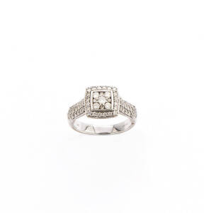 VARIOUS: Two white gold and diamond rings and pendant. 10.65 grams.