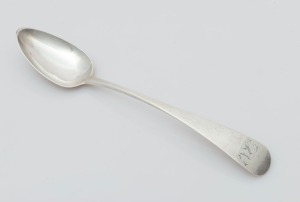 An antique CHANNEL ISLANDS silver serving spoon by JACQUES QUESNEL of Jersey, circa 1800, engraved with monogram, 28.5cm long, 96 grams total