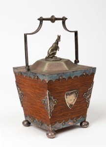 An antique oak and silver plated ice bucket with white porcelain liner and kangaroo decoration, late 19th century, stamped "ELKINGTON, SYDNEY", 20cm high overall