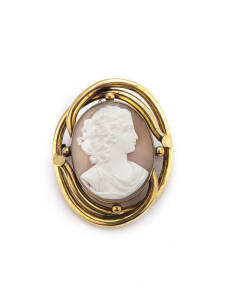 CAMEO BROOCH: Victorian helmet shell cameo brooch. Base metal.
