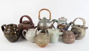 Nine assorted Australian studio pottery teapots, including examples by ALAN PEASCOD, JEFF MINCHAM and JOHN DERMER, the John Dermer example 28cm high overall