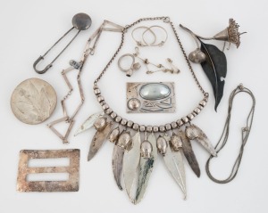 Contemporary and Modernist Australian silver jewellery including a gum blossom brooch, gumnut necklace, gumnut ring, silver buckle, pearl and silver pendant, etc, (11 items), 200 grams total